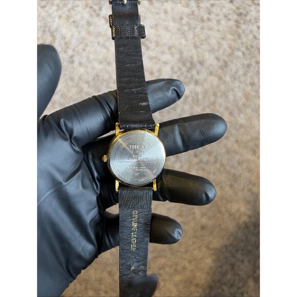 VTG Timex T Cell Quartz Gold Case Black Leather Band Water Resistant Watch WMN